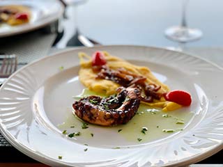 Octopus at Greek restaurant Mitsis Rodos Village Beach Hotel & Spa